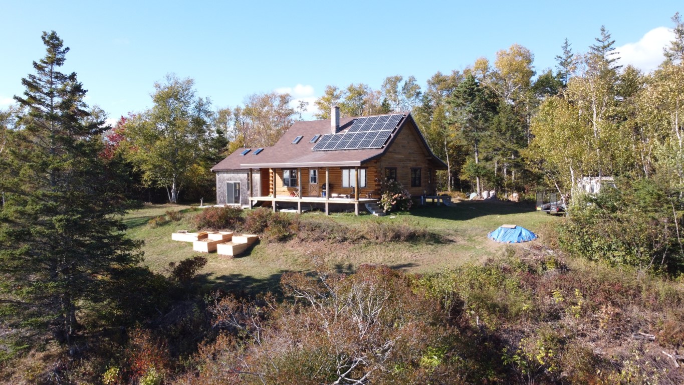 Aerial drone view of a completed rooftop solar installation